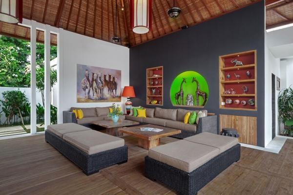 Open Style Living Area And Big Rattan Sofa